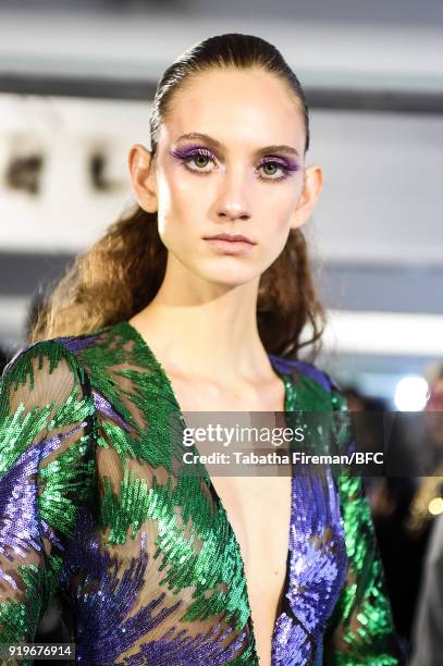 Model backstage ahead of the Halpern show during London Fashion Week February 2018 on February 17, 2018 in London, England.