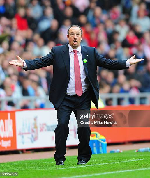 Liverpool manager Rafael Benitez reacts after a goal, that deflected off a beachball, went against them during the Barclays Premier League match...