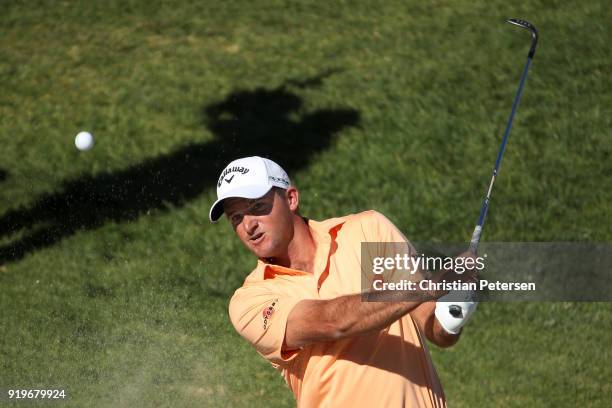 Sam Saunders plays his shot from the bunker on the 14th hole during the third round of the Genesis Open at Riviera Country Club on February 17, 2018...