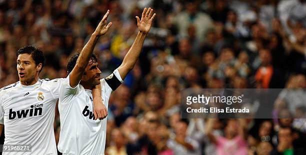 Xabi Alonso and Raul Gonzalez of Real Madrid celebrate after scoring during the La Liga match between Real Madrid and Real Valladolid at Estadio...
