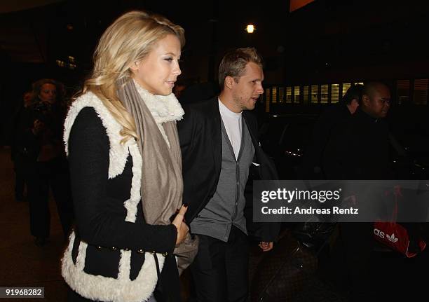 Oliver Pocher and Sandy Meyer Woelden leave the Hotel during the Mc Donalds Fundraising Gala at Hyatt Hotel on October 17, 2009 in Berlin, Germany.