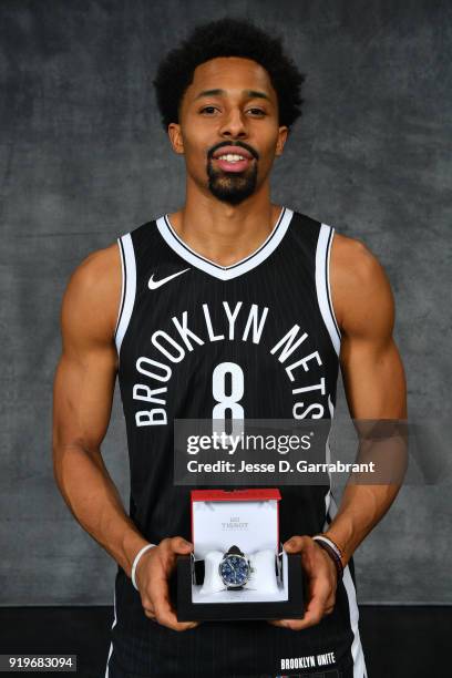 Spencer Dinwiddie of the Brooklyn Nets pose for a portrait with a Tissot watch as the winner of the 2018 Taco Bell Skills Challenge during State Farm...