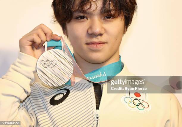 Silver Medalist Figure Skater Shoma Uno of Japan poses with his medal during a press conference at Japan House on February 18, 2018 in...