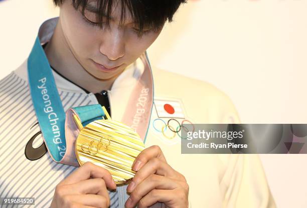 Gold Medalist Figure Skater Yuzuru Hanyu poses with his medal during a press conference at Japan House on February 18, 2018 in Pyeongchang-gun, South...