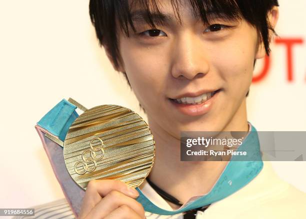 Gold Medalist Figure Skater Yuzuru Hanyu poses with his medal during a press conference at Japan House on February 18, 2018 in Pyeongchang-gun, South...