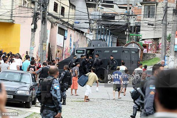 Police armoured car blocks one of the accesses to the Morro dos Macacos shantytown in Rio de Janeiro, Brazil October 17, 2009. Two police officers...