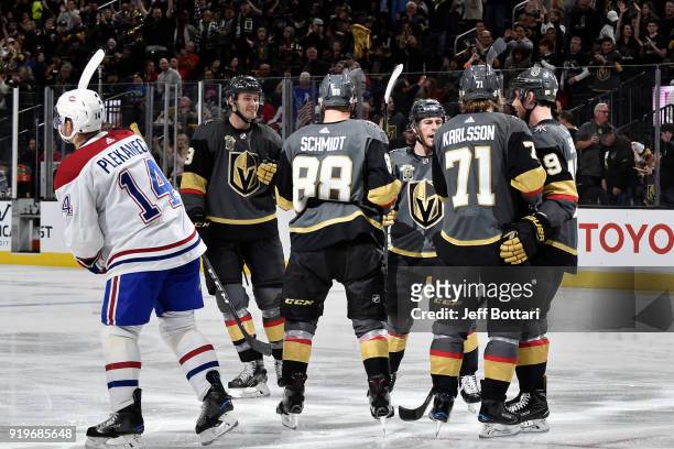 Tomas Plekanec of the Montreal Canadiens reacts as Nate Schmidt celebrates his goal with his teammates Brayden McNabb, William Karlsson, Jonathan...