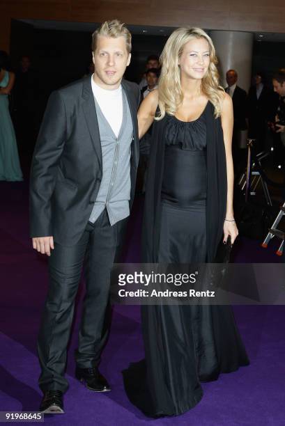 Oliver Pocher and Sandy Meyer Woelden attend the Mc Donalds Fundraising Gala at Hyatt Hotel on October 17, 2009 in Berlin, Germany.