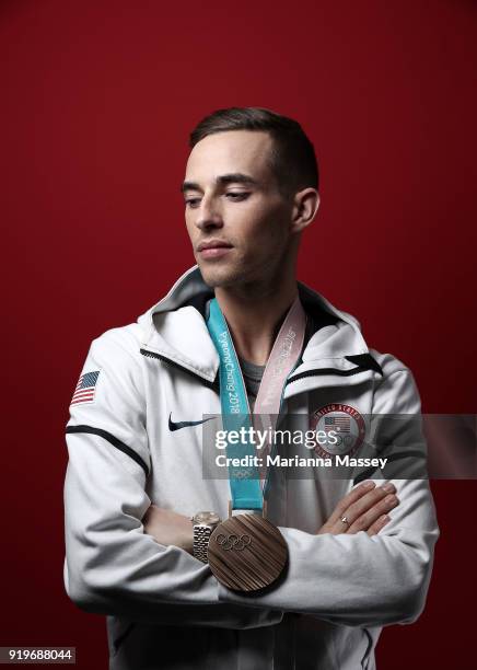 United States Men's Figure Skater Adam Rippon poses for a portrait with his Bronze medal for the team event on the Today Show Set on February 17,...