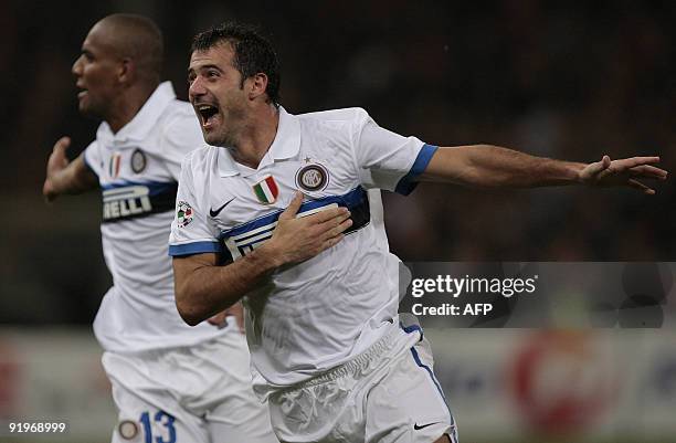 Inter Milan's Serbian midfielder Dejan Stankovic celebrates after scoring a goal against Genoa during their Serie A football match at Ferraris...