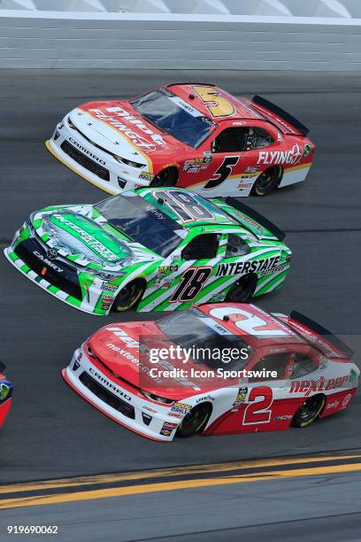 Three wide action in Turn 4 during the Powershares QQQ 300 NASCAR Xfinity Series race on February 17 at the Daytona International Speedway in Daytona...