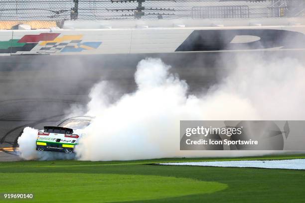 Tyler Reddick, JR Motorsports, BurgerFi Chevrolet Camaro does a burnout after winning the Powershares QQQ 300 NASCAR Xfinity Series race on February...