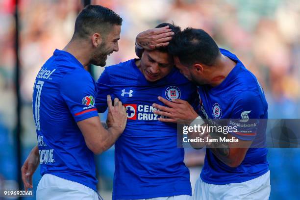 Julio Dominguez of Cruz Azul celebrates with teammates Martín Cauteruccio and Julian Velazquez after scoring the first goal of his team with...