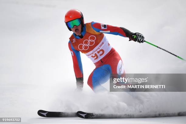 Luxembourg's Matthieu Osch reacts after competing in the Men's Giant Slalom at the Jeongseon Alpine Center during the Pyeongchang 2018 Winter Olympic...