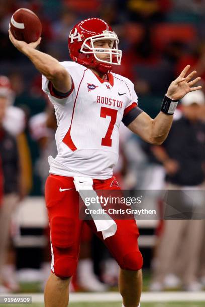 Quarterback Case Keenum of the Houston Cougars throws the ball against the Tulane Green Wave at the Louisiana Superdome on October 17, 2009 in New...