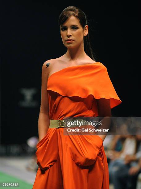 Model displays a design by Colombia's Johanna Ortiz Collection during the fourth day of Cali Exposhow 2009 on October 16, 2009 in Cali, Colombia.