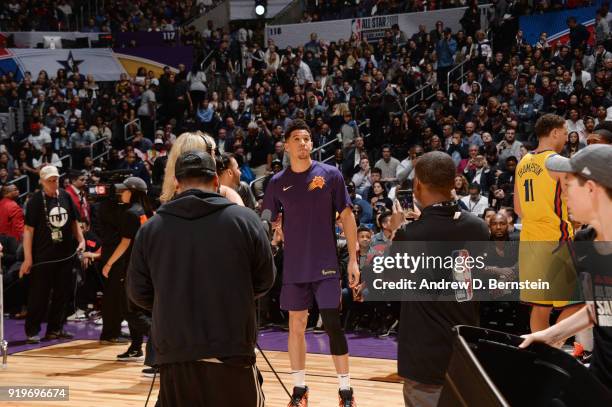 Devin Booker of the Phoenix Suns looks on during the JBL Three-Point Contest during State Farm All-Star Saturday Night as part of the 2018 NBA...