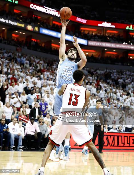 Luke Maye of the North Carolina Tar Heels shoots the ball against the Louisville Cardinals during the game at KFC YUM! Center on February 17, 2018 in...