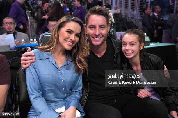 Chrishell Stause, Justin Hartley and Isabella Justice Hartley attend the 2018 Taco Bell Skills Challenge at Staples Center on February 17, 2018 in...