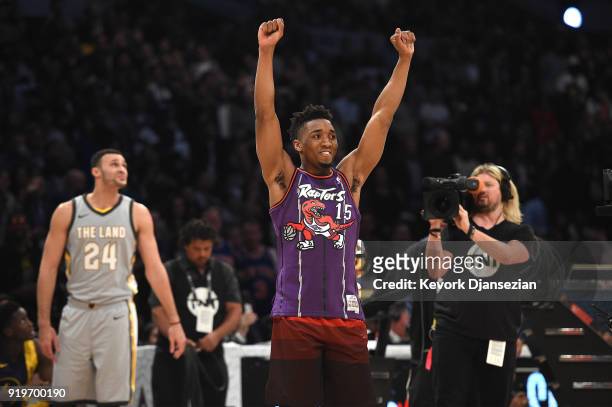 Donovan Mitchell of the Utah Jazz and Larry Nance Jr. #24 of the Cleveland Cavaliers compete in the 2018 Verizon Slam Dunk Contest at Staples Center...