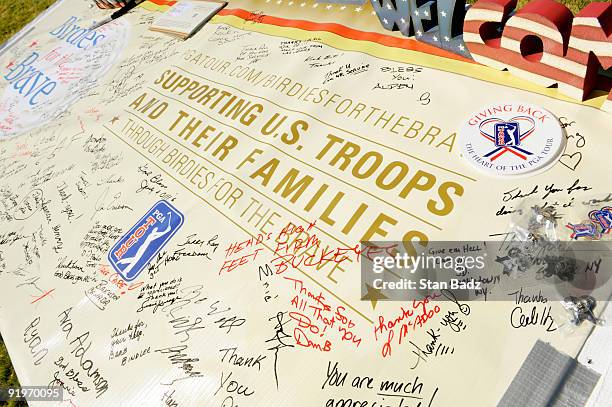 Banner supporting U.S. Troops and their families was on display at the Military Outpost during the third round of the Justin Timberlake Shriners...