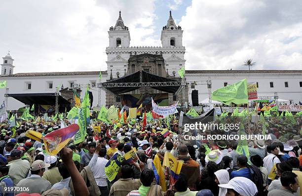 Ecuadoreans take part in a rally in support of President Rafael Correa's adminstration in Quito on October 17,2009. Correa announced the prompt...