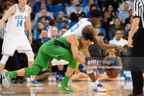 Oregon Ducks guard Elijah Brown battles for a loose ball against UCLA Bruins guard Kris Wilkes during the game between the Oregon Ducks and the UCLA...