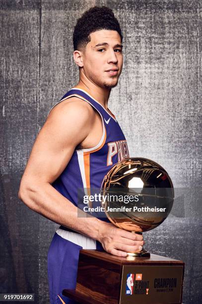 Devin Booker of the Phoenix Suns poses for a portrait after winning the the JBL Three Point Contest during All-Star Saturday Night as part of 2018...