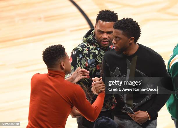 Chadwick Boseman and Anthony Anderson attend the 2018 JBL Three-Point Contest at Staples Center on February 17, 2018 in Los Angeles, California.