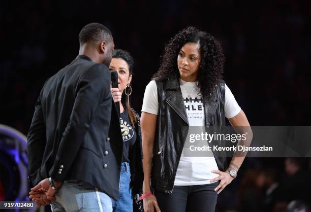 Candace Parker takes center court with Dwyane Wade prior to the 2018 Taco Bell Skills Challenge at Staples Center on February 17, 2018 in Los...