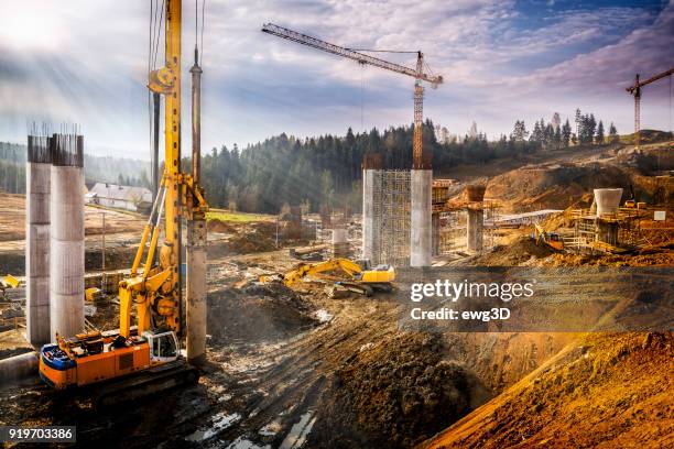 sunset over construction of the viaduct on the new s7 highway, poland - estrutura criada por humanos imagens e fotografias de stock