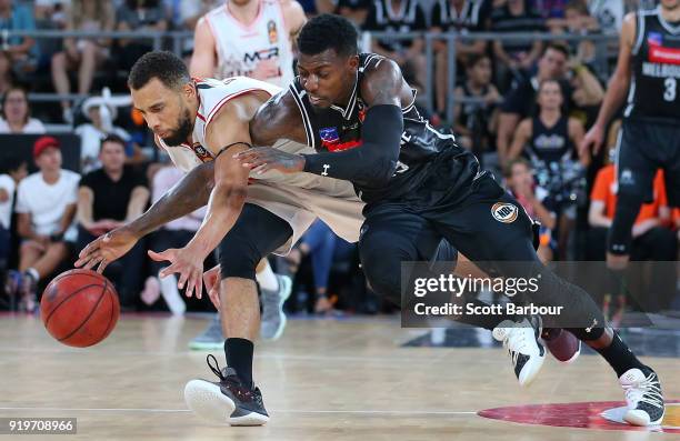 Casey Prather of Melbourne United and Demitrius Conger of the Hawks compete for the ball during the round 19 NBL match between Melbourne United and...