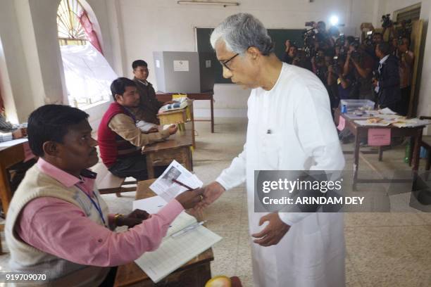 Chief minister of Tripura Manik Sarkar arrives to cast his vote at a polling station during Tripura legislative assembly elections in Agartala, the...