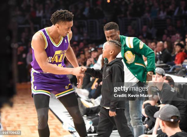 Player Donovan Mitchell of the Utah Jazz with Kevin Hart, Jordan Mitchell and Hendrix Hart during the 2018 State Farm All-Star Saturday Night at...