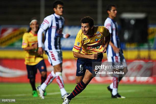 Miguel Sabah of Morelia celebrates scoed goal during their match in the 2009 Opening tournament, the closing stage of the Mexican Football League, at...