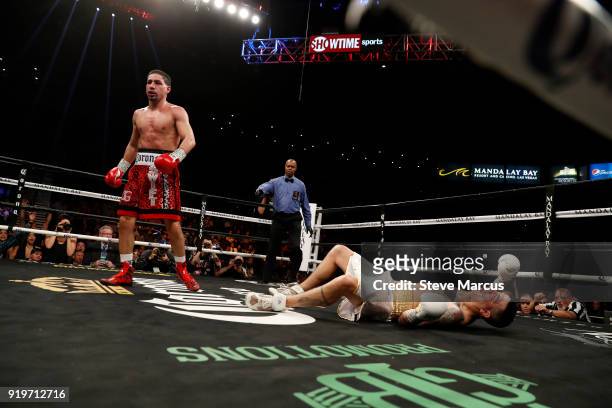 Danny Garcia heads to a neutral corner after knocking down Brandon Rios during the ninth round of their welterweight boxing match at the Mandalay Bay...