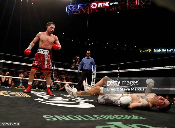 Danny Garcia knocks Brandon Rios to the canvas during the ninth round of their welterweight boxing match at the Mandalay Bay Events Center on...