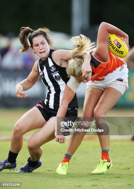Jess Duffin of the Magpies tackles Phoebe McWilliams of GWS during the round three AFLW match between the Collingwood Magpies and the Greater Western...