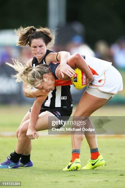 Jess Duffin of the Magpies tackles Phoebe McWilliams of GWS during the round three AFLW match between the Collingwood Magpies and the Greater Western...