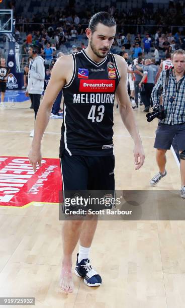 Chris Goulding of Melbourne United leaves the court injured during the round 19 NBL match between Melbourne United and the Illawarra Hawks at Hisense...