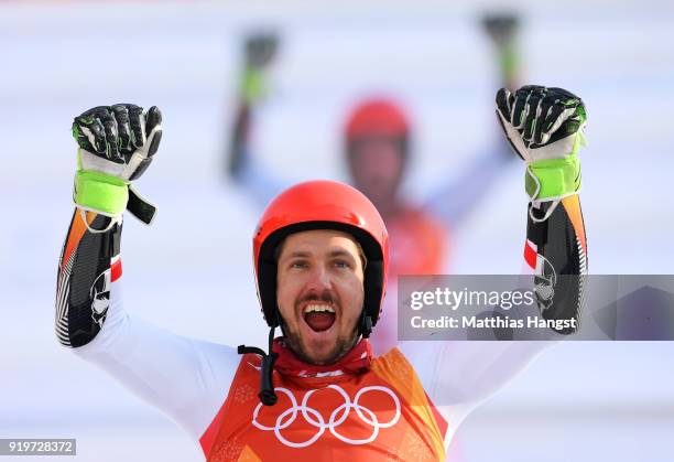 Gold medallist Marcel Hirscher of Austria celebrates during the victory ceremony for the Alpine Skiing Men's Giant Slalom on day nine of the...
