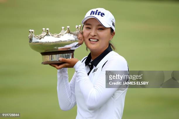 Ko Jin-young of South Korea poses with the winner's trophy after her victory in the final round of the Women's Australian Open at Kooyonga Golf Club...