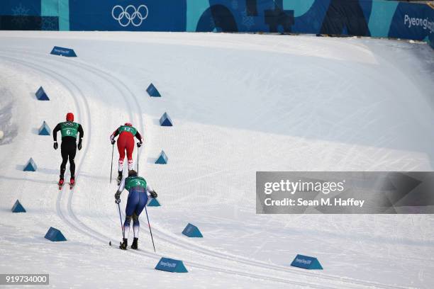 Thomas Bing of Germany, Graeme Killick of Canada, Daniel Rickardsson of Sweden compete during Cross-Country Skiing men's 4x10km relay on day nine of...
