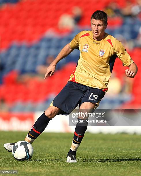 Michael Bridges of the Jets runs with the ball during the round 11 A-League match between the Newcastle Jets and the Melbourne Victory at...