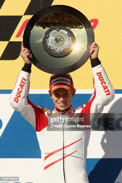 Casey Stoner of Australia and the Ducati Marlboro Team celebrates on the podium after winning the Australian MotoGP, which is round 15 of the MotoGP...