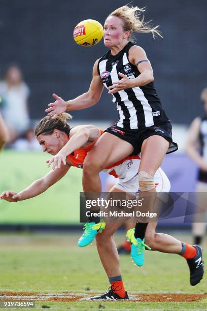 Jamiee Lambert of the Magpies competes for the ball over Pepa Randall of GWS during the round three AFLW match between the Collingwood Magpies and...