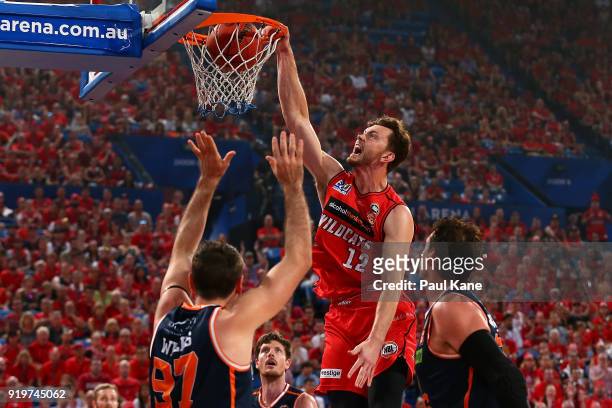 Angus Brandt of the Wildcats dunks the ball during the round 19 NBL match between the Perth Wildcats and the Cairns Taipans at Perth Arena on...