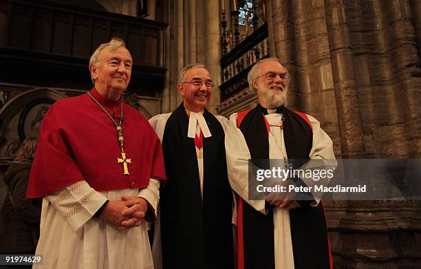 The Archbishop of Canterbury, Reverend Dr Rowan Williams stands with The Dean of Westminster, Reverend Dr John Hall and The Archbishop of...