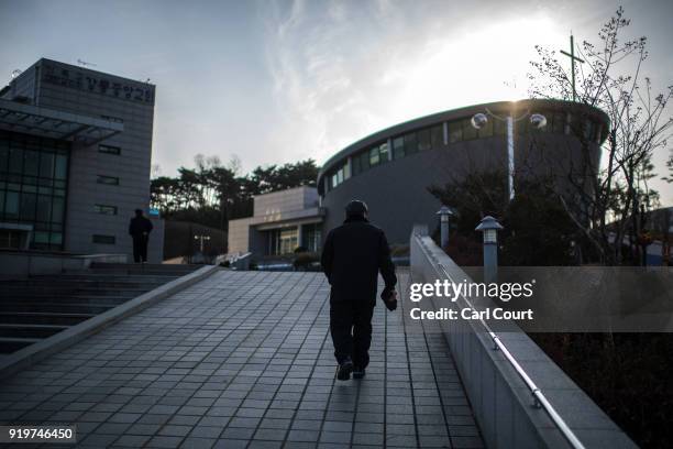 Men walk to attend Sunday Service at Gangneung Jungang Methodist Church on February 18, 2018 in Gangneung, South Korea. Around thirty percent of...