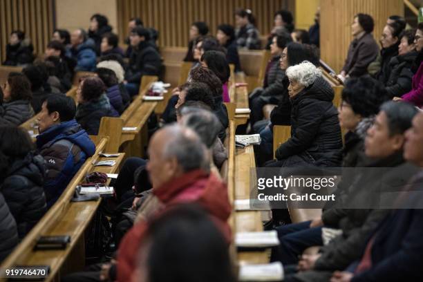 Worshippers attend Sunday Service at Gangneung Jungang Methodist Church on February 18, 2018 in Gangneung, South Korea. Around thirty percent of...